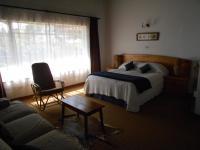 Bed Room 1 - 25 square meters of property in Muldersdrift