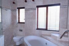 Main Bathroom - 9 square meters of property in Woodhill Golf Estate