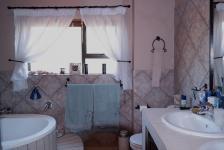 Main Bathroom - 9 square meters of property in Woodhill Golf Estate