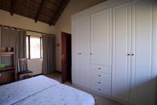 Bed Room 1 - 16 square meters of property in Woodhill Golf Estate