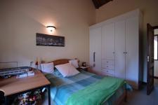 Bed Room 2 - 16 square meters of property in Woodhill Golf Estate