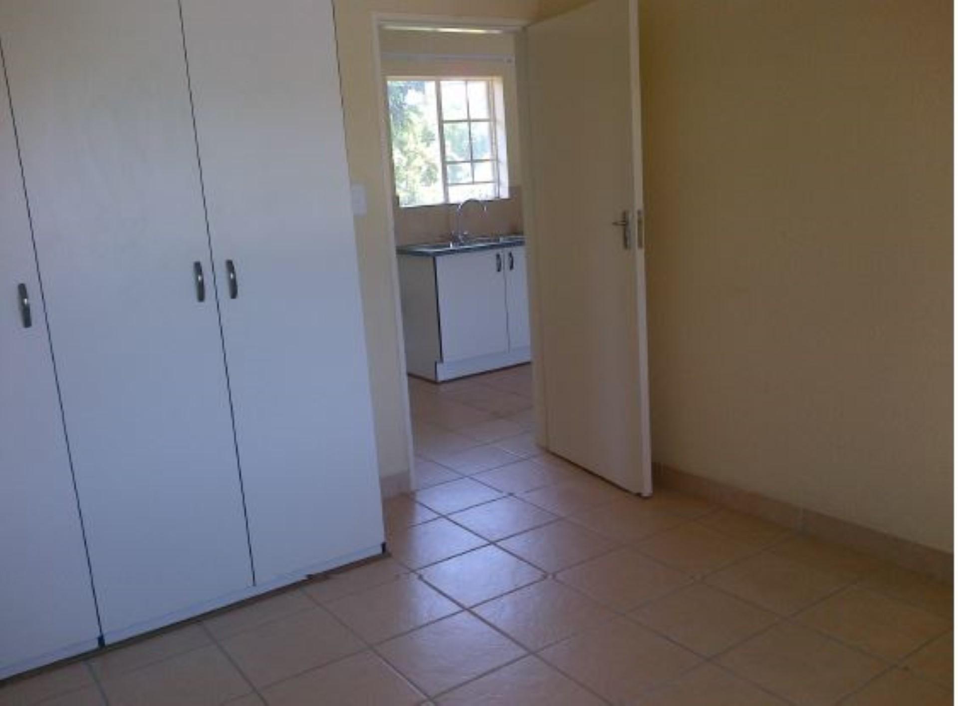 Bed Room 1 - 12 square meters of property in Rustenburg