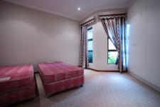 Bed Room 1 - 17 square meters of property in Woodhill Golf Estate