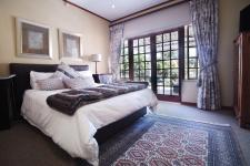 Main Bedroom - 20 square meters of property in Woodhill Golf Estate