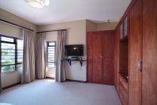 Bed Room 1 - 21 square meters of property in Woodhill Golf Estate