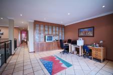 Informal Lounge of property in Woodhill Golf Estate