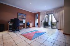Informal Lounge of property in Woodhill Golf Estate