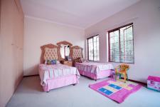 Bed Room 1 - 21 square meters of property in Woodhill Golf Estate