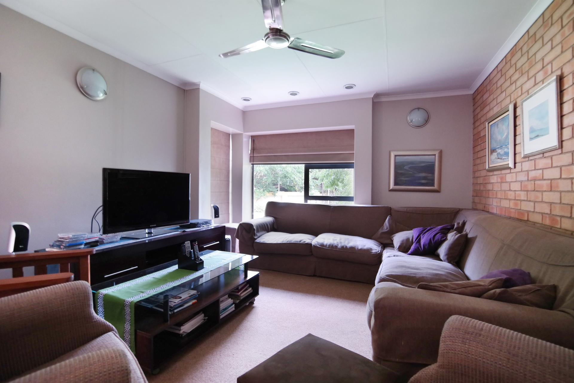 TV Room of property in Woodhill Golf Estate