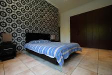 Main Bedroom - 22 square meters of property in Willow Acres Estate