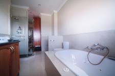 Main Bathroom of property in Silver Lakes Golf Estate