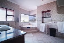 Main Bathroom - 25 square meters of property in Woodhill Golf Estate