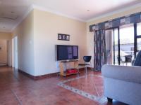 Informal Lounge of property in Woodhill Golf Estate