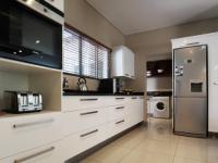 Kitchen - 24 square meters of property in Woodhill Golf Estate