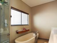 Main Bathroom - 13 square meters of property in Woodhill Golf Estate