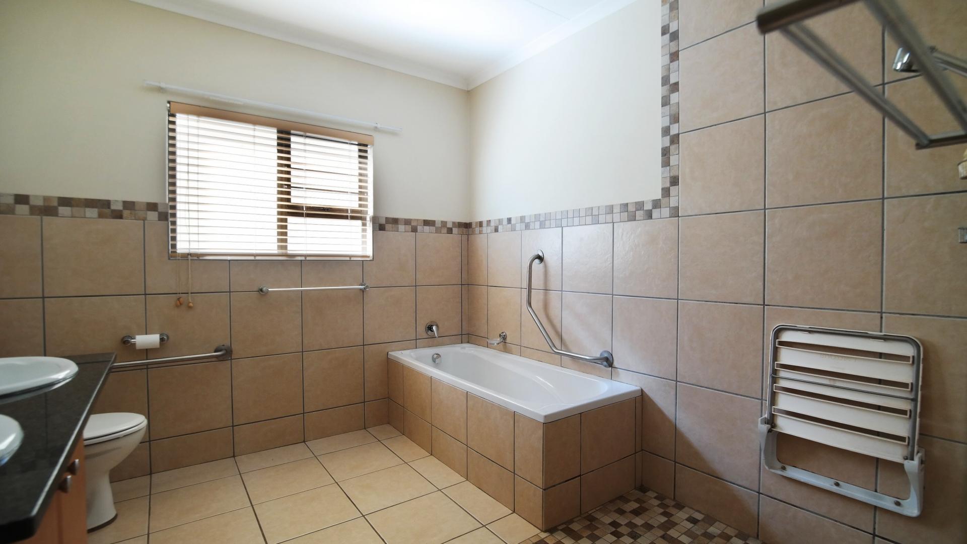 Bathroom 1 of property in The Meadows Estate