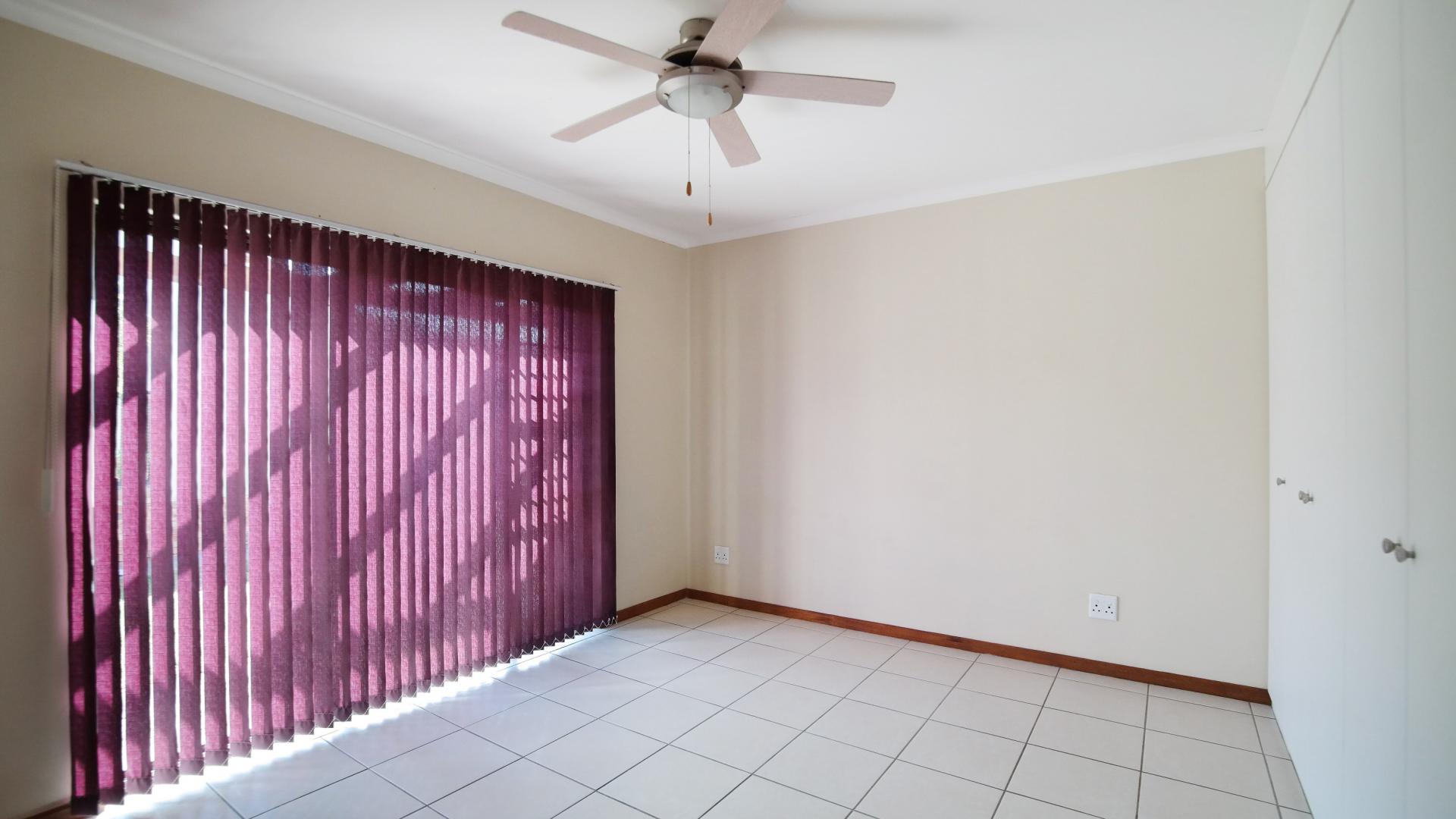 Main Bedroom of property in The Meadows Estate