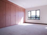 Main Bedroom - 29 square meters of property in Woodhill Golf Estate