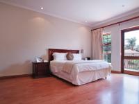 Main Bedroom - 38 square meters of property in Woodhill Golf Estate