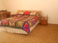 Main Bedroom of property in Pretoria Rural