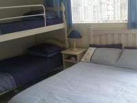 Bed Room 1 of property in Hartenbos
