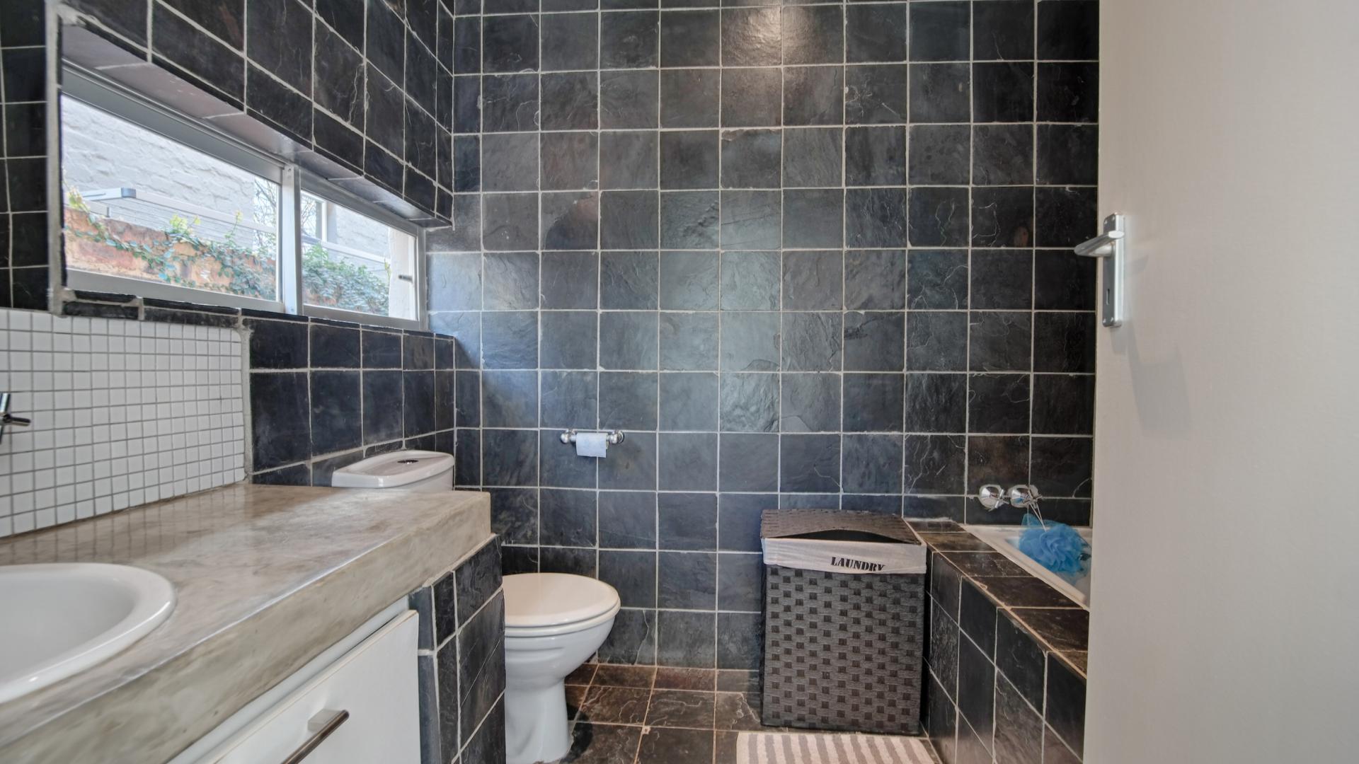 Main Bathroom of property in Olympus Country Estate