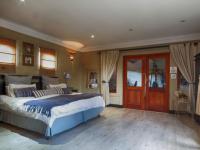 Main Bedroom - 62 square meters of property in Woodhill Golf Estate