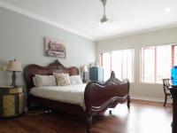 Main Bedroom of property in Woodhill Golf Estate