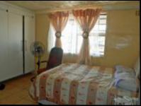 Main Bedroom of property in Klipspruit West