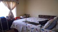 Main Bedroom of property in Protea Glen