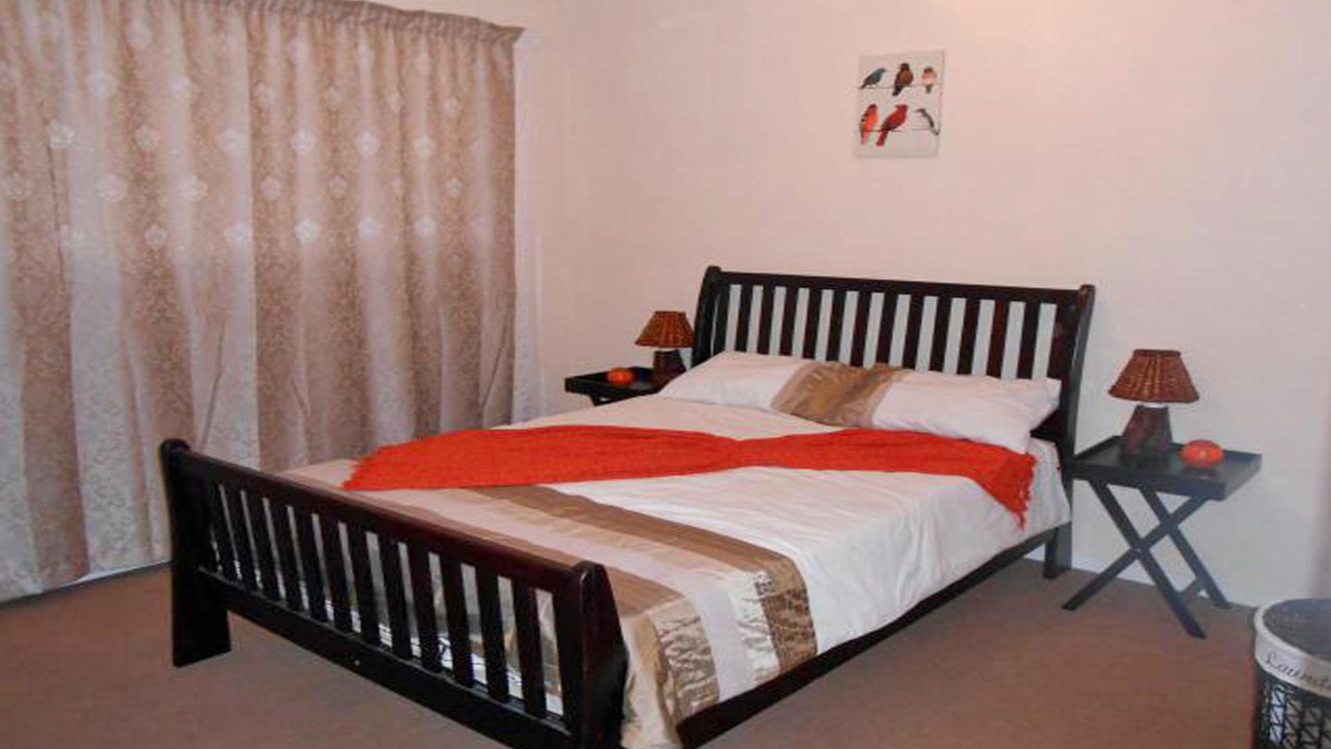 Bed Room 1 of property in Rustenburg