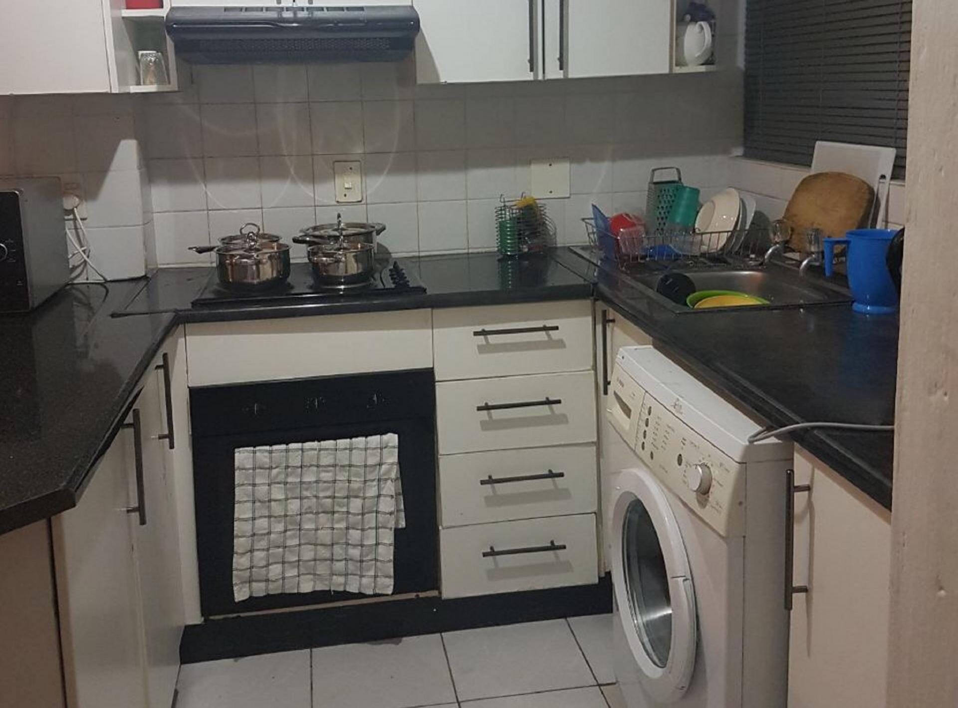 Kitchen of property in Sandton