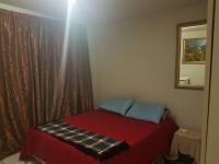 Main Bedroom of property in Sandton