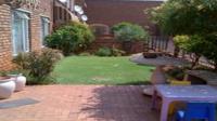 Patio of property in Berton Park