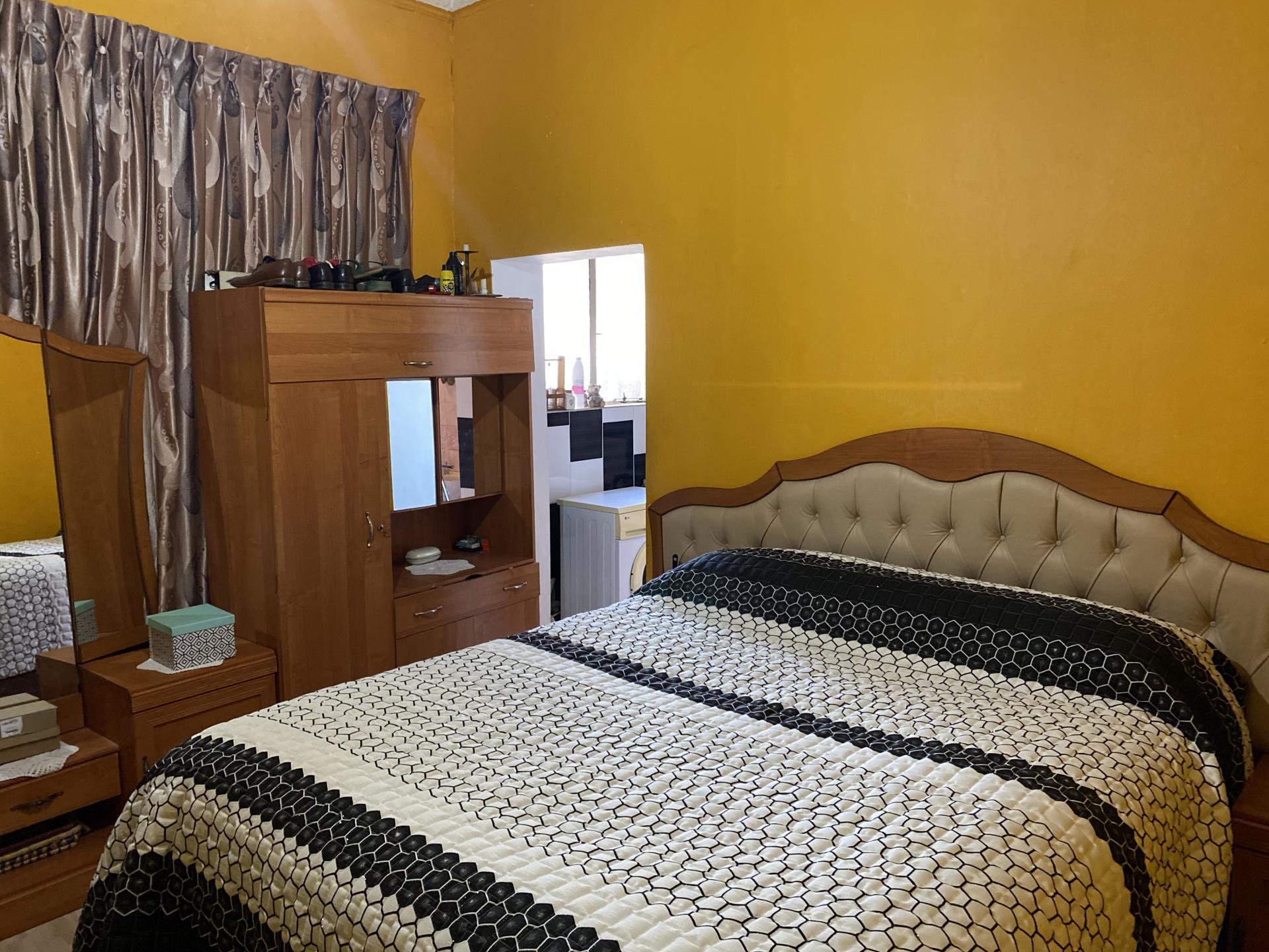 Main Bedroom of property in Brixton