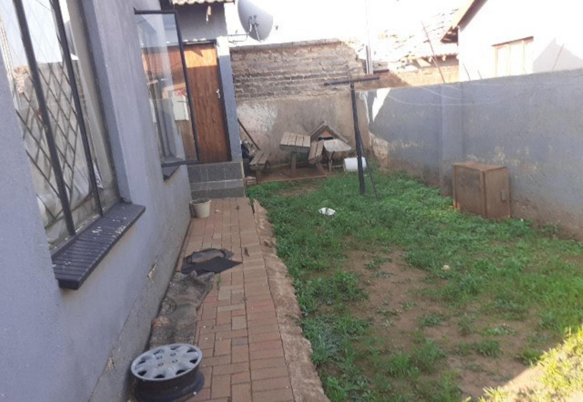 Backyard of property in Clayville