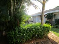 Front View of property in Palm Lakes Family Estate