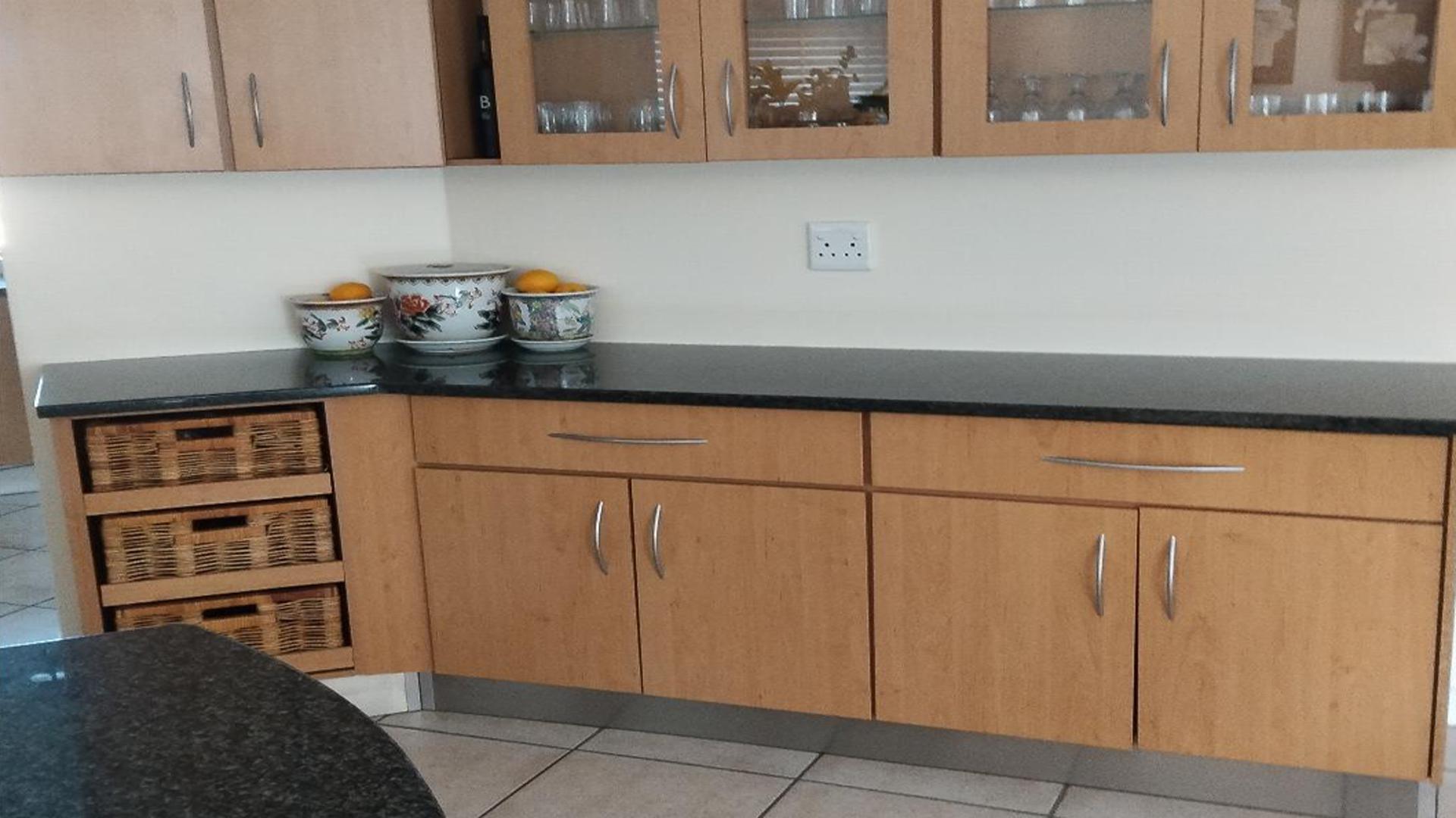 Kitchen of property in Rooihuiskraal North