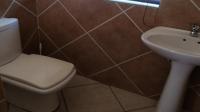 Bathroom 3+ of property in Rooihuiskraal North