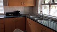Kitchen of property in Rooihuiskraal North