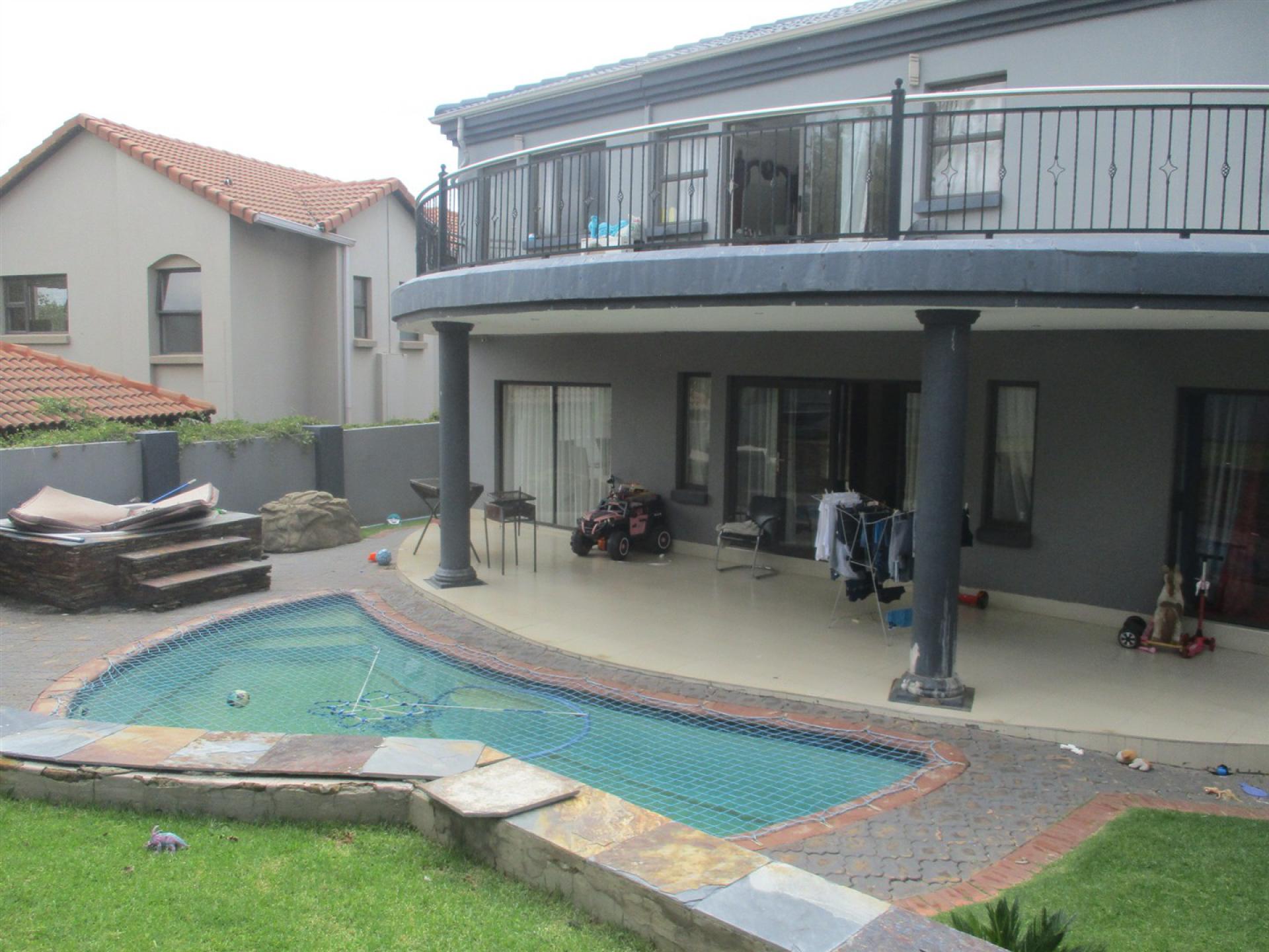 Backyard of property in Blue Valley Golf Estate
