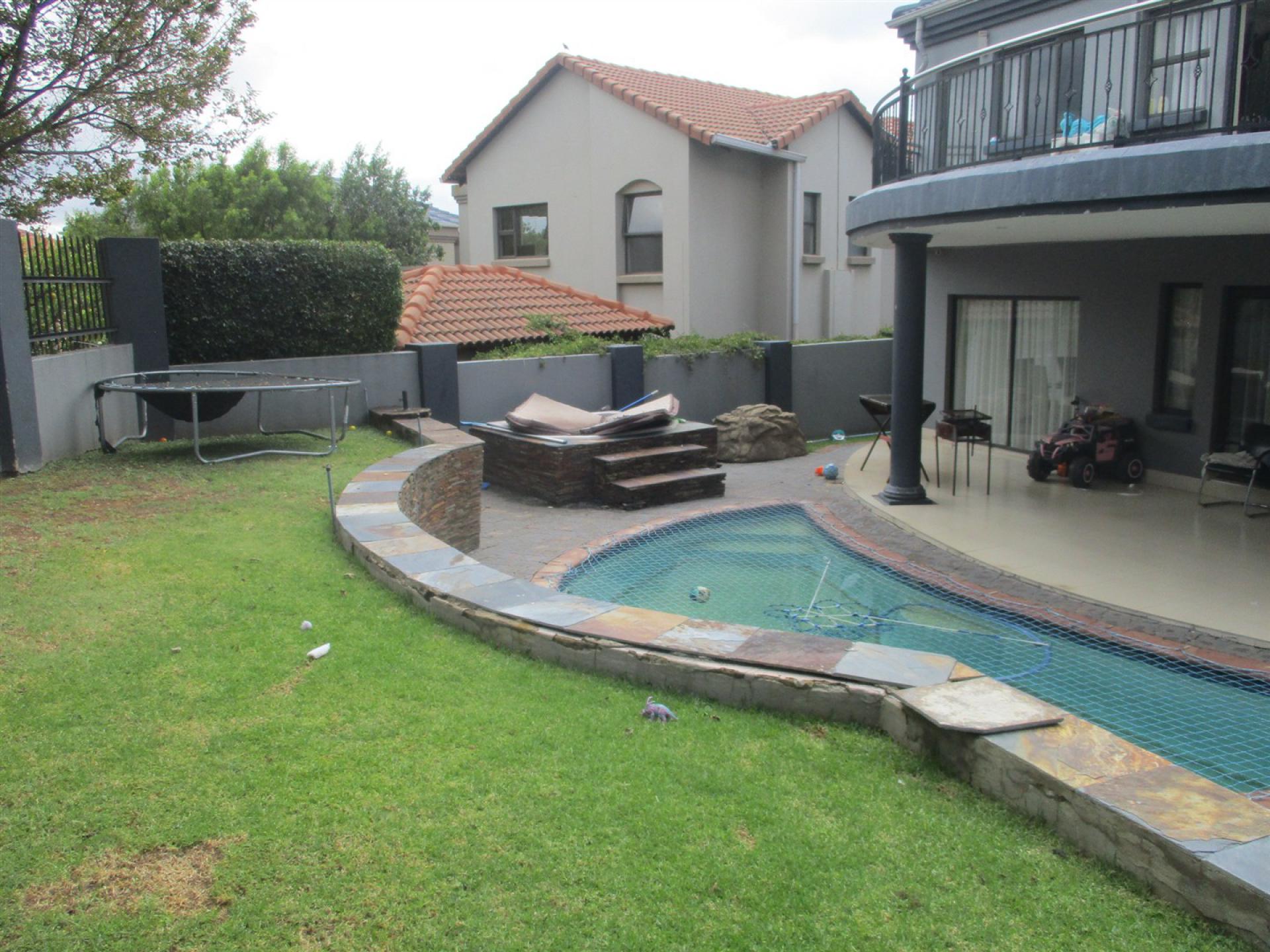Backyard of property in Blue Valley Golf Estate