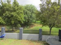 Backyard of property in Blue Valley Golf Estate