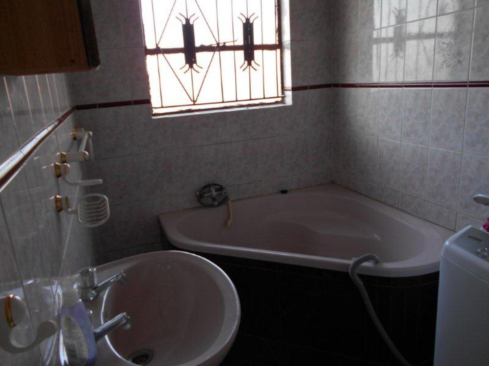 Main Bathroom of property in Zamdela