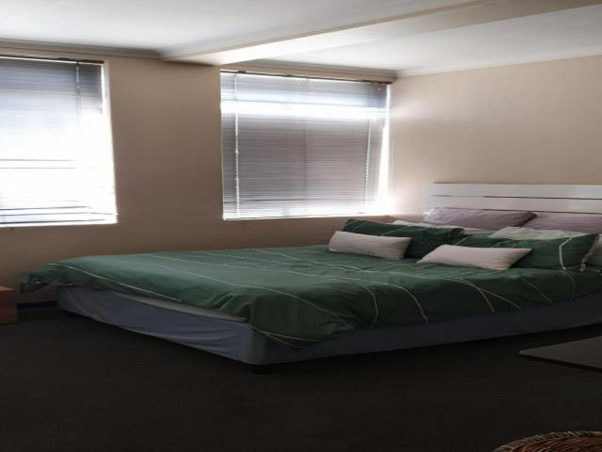 Bed Room 1 of property in Braamfontein