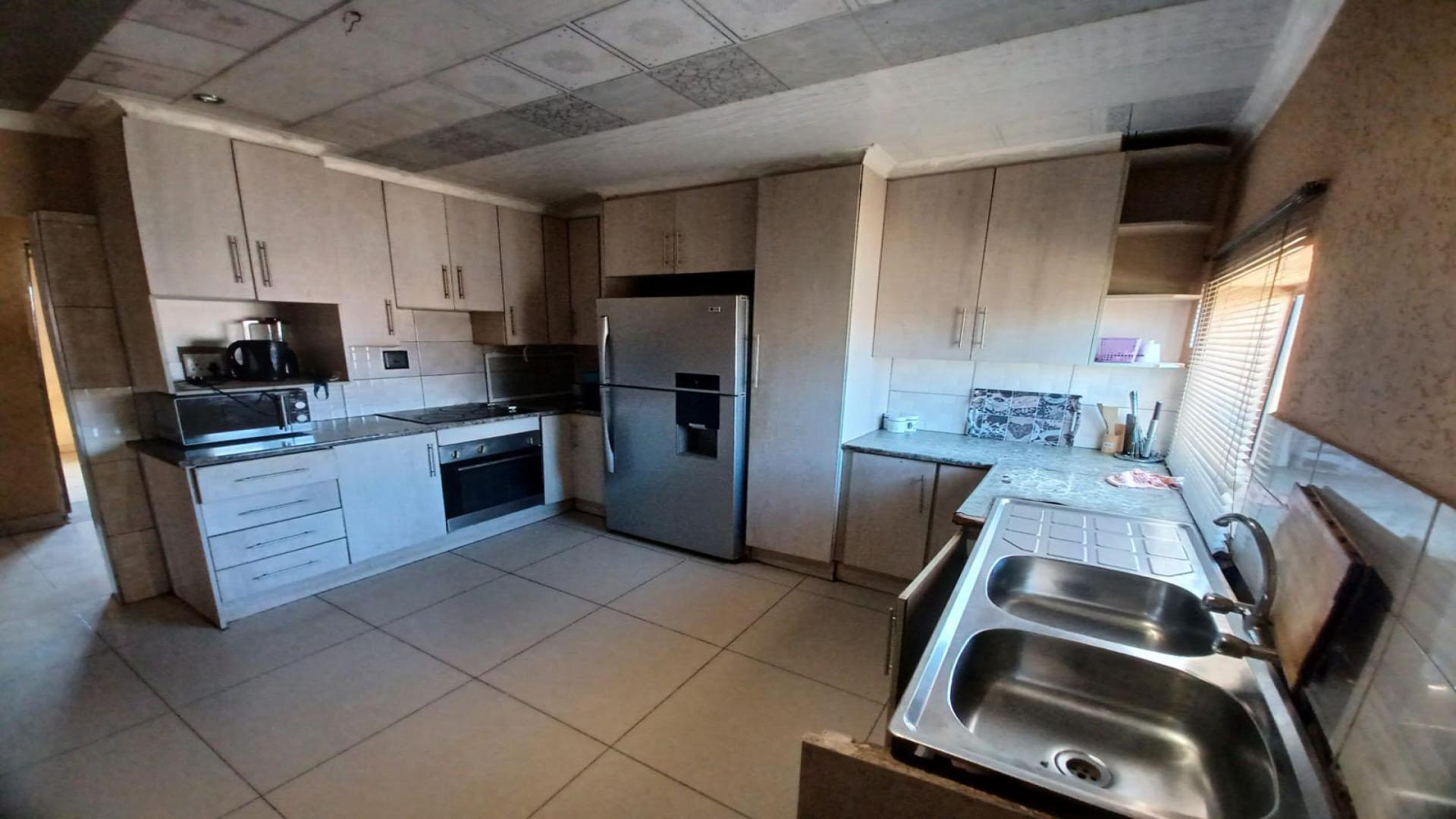 Kitchen of property in Johannesburg Central