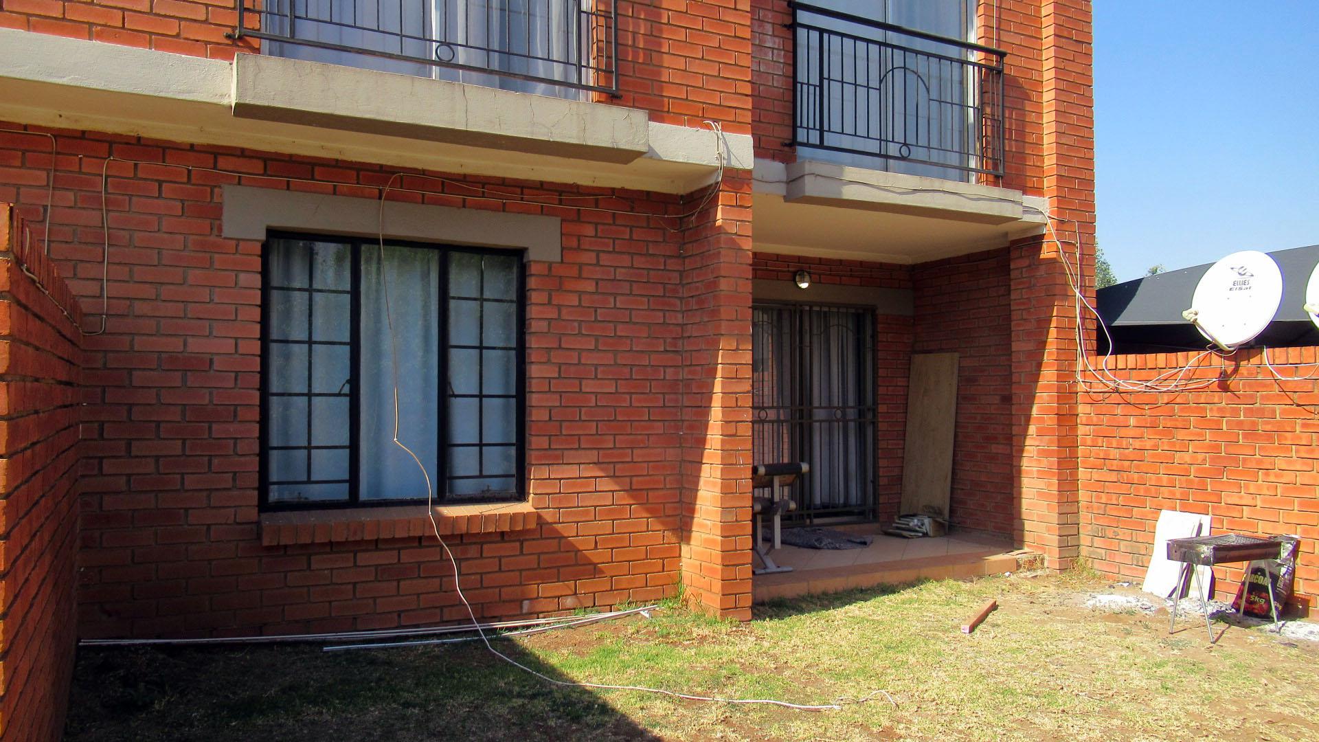 Backyard of property in Sagewood