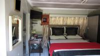 Bed Room 1 - 10 square meters of property in Umtentweni
