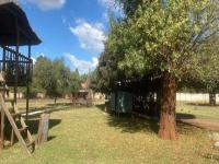 Backyard of property in Waters Edge AH