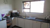 Kitchen of property in North Riding A.H.